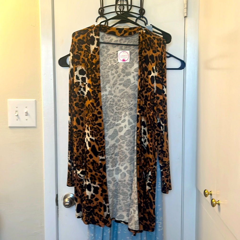 NWT animal print cover cardigan pockets long sleeve very cute silky to the touch